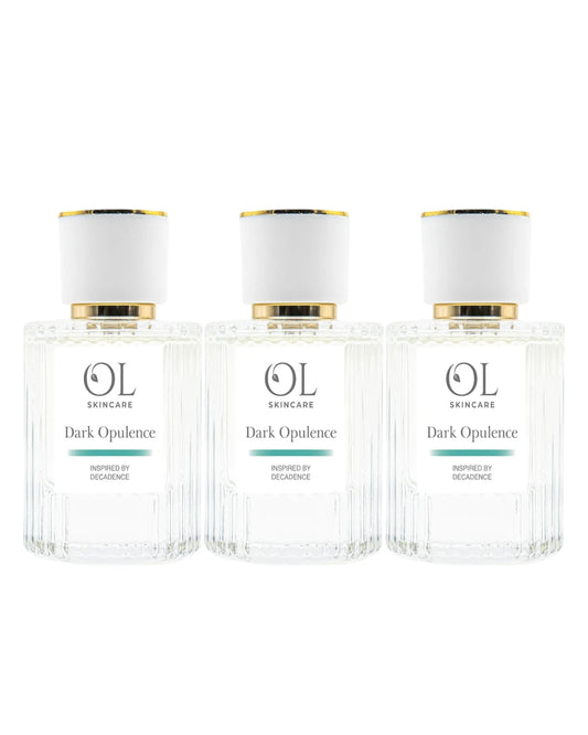 Three bottles of OL Skincare Dark Opulence on a white background