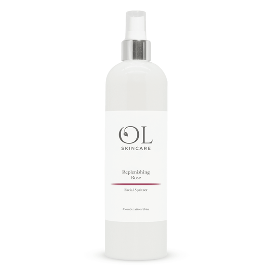 OL Skincare Replenishing Rose Facial Spray in a white bottle with a silver spray nozzle and a white label.