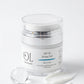OL Skincare SPF 50 Derma Veil Face Cream in a clear jar with a white lid and label, styled on a white background with a clear gel drop, a smear of white cream, and a small pile of powder.