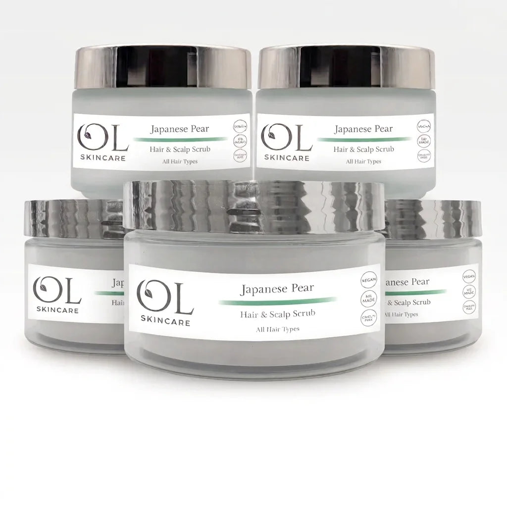 Five jars of OL Skincare Japanese Pear Hair & Scalp Scrub arranged in a studio composition on a white background.