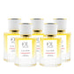 Five bottles of Luna Belle perfume on a white background