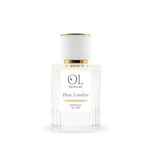perfume bottle labeled 'Fleur Lumére' by OL Skincare on a white background