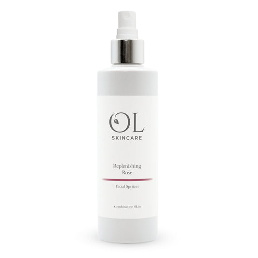white bottle of rose toner on white back ground 
