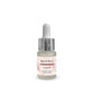 A small glass dropper bottle of Spiced Berry Cuticle Oil with a white dropper cap, silver collar, and a white label with pink accents, set against a plain white background.