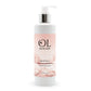 A white pump bottle of OL Skincare Spiced Berry Hand & Body Wash with a silver pump collar and a pink label, shown on a white background.