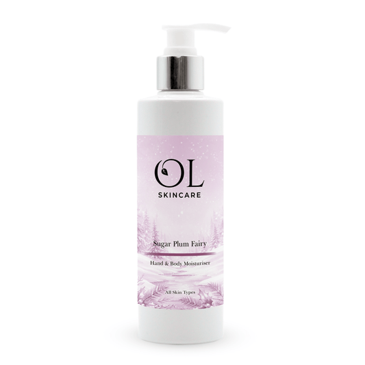 OL Skincare Sugar Plum Fairy Hand & Body Moisturizer in a white pump bottle with a silver collar and a light purple label, shown on a white background.