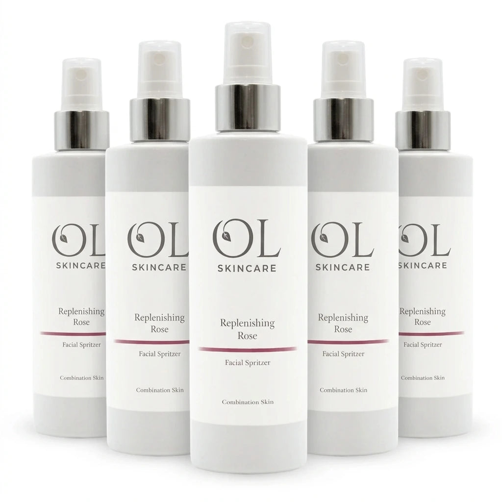 Five white OL Skincare Replenishing Rose Facial Spritzers with silver pump collars arranged in a row against a white background.
