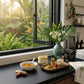 Turmeric clay mask with skincare products by window